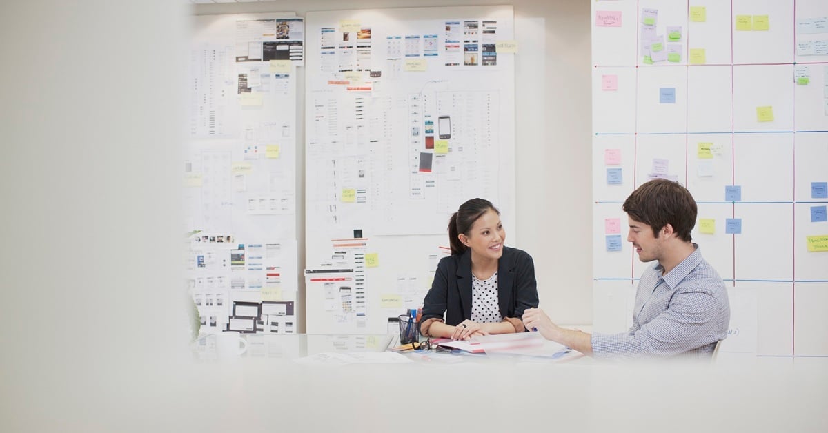 people sitting in a meeting room